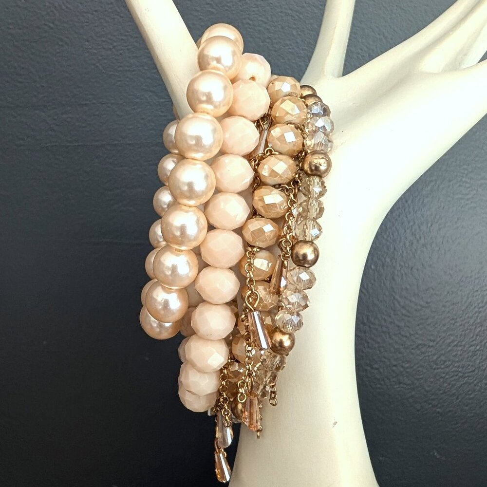 Bundle of nude and natural beaded stretch bracelets